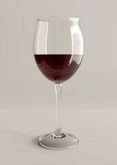 Glass of red wine on gray background