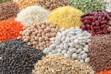 Obraz premium Different types of legumes and cereals as background, closeup. Organic grains