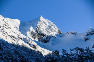 Fototapeta na wymiar Snowy mountain in Cumbres del Martial, Tierra del Fuego
