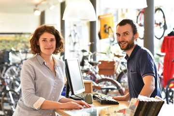 Bicycle shop consulting - salesman and customer in conversation