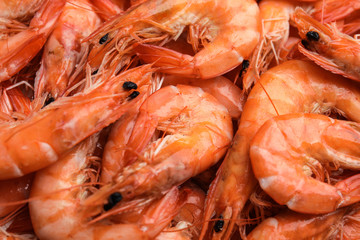 Pile of delicious cooked shrimps as background, closeup