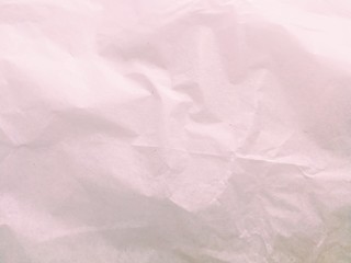 Full frame shot of crumpled light pink paper