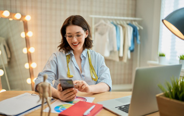 Woman is working at workshop