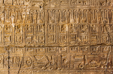 Ancient stone column with Egyptian hieroglyphs
