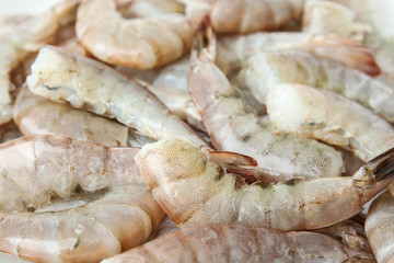 Fresh raw shrimps as background, closeup view