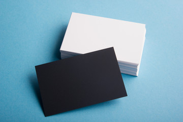 Business card blank on wooden background. Corporate Stationery, Branding Mock-up. Creative designer desk. Flat lay. Copy space for text