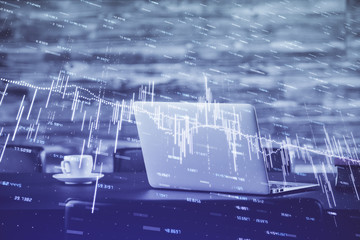 Forex market chart hologram and personal computer background. Multi exposure. Concept of investment.