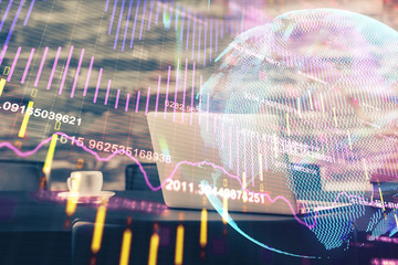 Multi exposure of forex graph and work space with computer. Concept of international online trading.