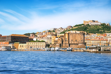 Fototapeta na wymiar View of Naples with forts from the sea, Italy