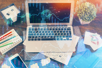 Multi exposure of chart and financial info and work space with computer background. Concept of international online trading.