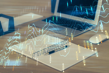 Multi exposure of chart and financial info and work space with computer background. Concept of international online trading.