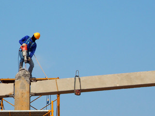 Man Working on the Working at height in construction site