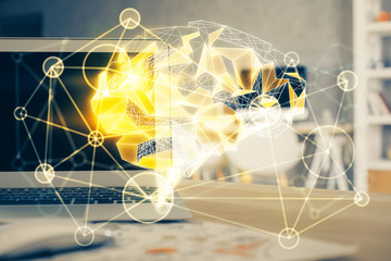 Double exposure of table with computer and brain hologram. Data innovation concept.