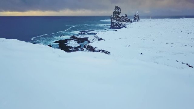 Aerial drone orbit at Londrangar cliffs, Snaefellsnes peninsula, Iceland 