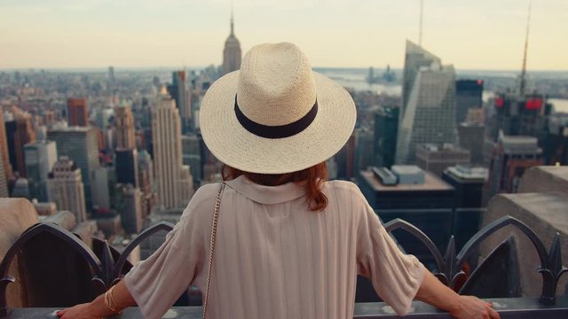 Young girl on the roof of a view point in New York