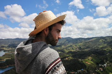 Young man dressed as a Chilean indigenous enjoying the spring breeze