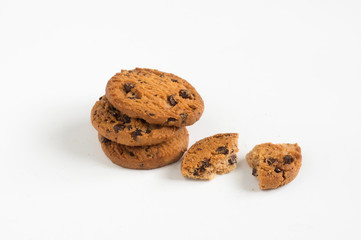 Sweet chocolate chips cookies on white background.
