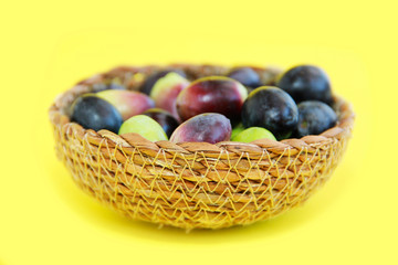 natural fresh black and burgundy olives in a decorative plate