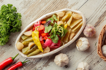 Caucasian Eastern European cuisine. Appetizer of salted vegetables. The photograph lay flat on the table.