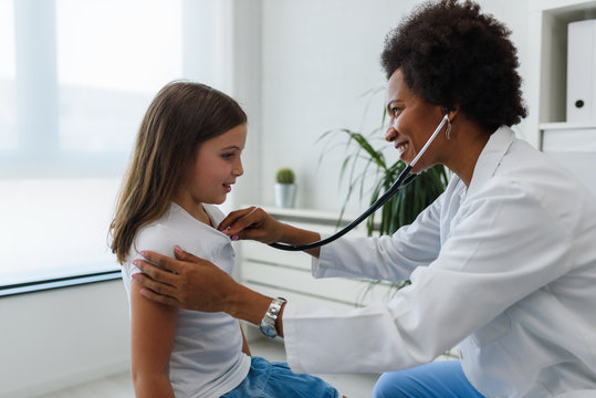 Doctor Examining Child With Stethoscope. Respiratory Disease Diagnostics And Treatment