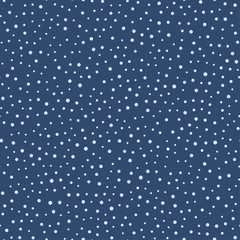 Falling snow on blue background, seamless pattern. Vector illustration