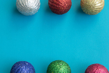 Christmas balls on blue paper background