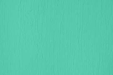 Trendy mint colored low contrast Concrete textured background with roughness and irregularities to your design or product. Color trend concept.
