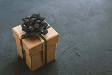 Christmas gift box on a black background.