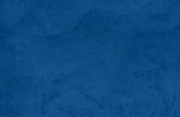 Fototapeta na wymiar Elegant dark blue colored Concrete textured background with roughness and irregularities to your design or product. 2020 color trend concept.