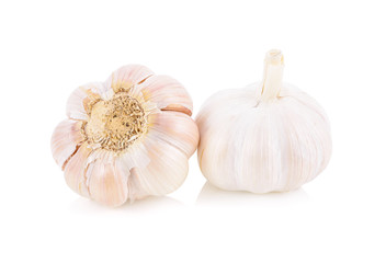 whole unpeeled bulb garlic on white background