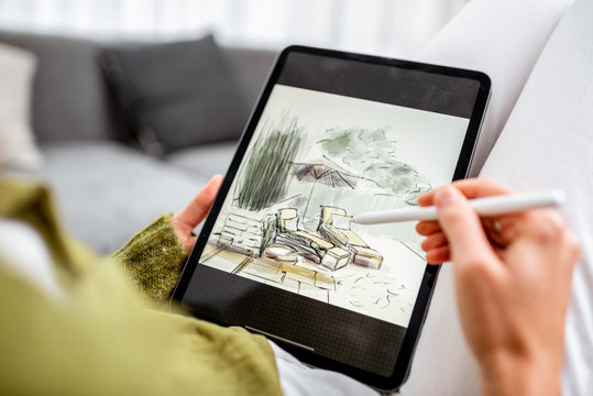 Artist Or Designer Making Landscape Design, Drawing On A Digital Tablet With Pencil, Close-up On A Screen. Designing On A Digital Touchpad Concept