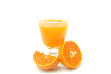Glass of orange juice and slices of orange fruit isolated on white background