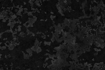 Black low contrast concrete textured wall background with roughness and irregularities to your concept or product.