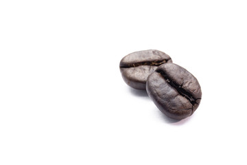 Macro shot show the detail of the coffee bean isolated in white background.