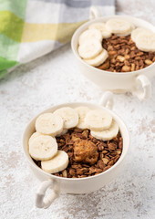 Granola, oatmeal with banana food background