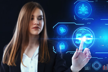 Business, Technology, Internet and network concept. Young businessman working on a virtual screen of the future and sees the inscription: 5G