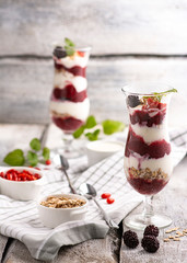 Exposition of fresh organic and nature smoothie. Tasty and healthy desert on white background.
