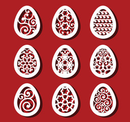 Easter eggs set. White ornamental eggs for laser cutting on red background. Icons for greeting card