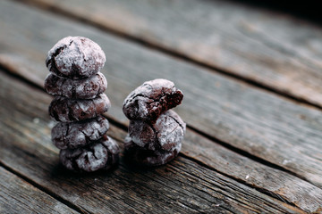 Chocolate Crinkle Cookies on an old wooden table