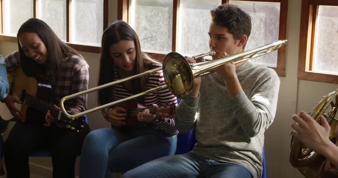 Teenage musicians rehearsing