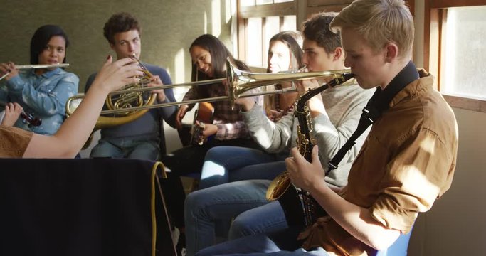 Teenage musicians rehearsing