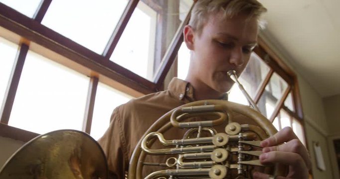 Teenage musicians rehearsing