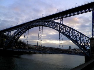 Porto, northwest of Portugal, at the mouth of the Douro River.  Narrow cobblestone streets and towering bridges