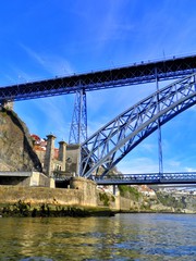 Fototapeta na wymiar Porto, northwest of Portugal, at the mouth of the Douro River. Narrow cobblestone streets and towering bridges