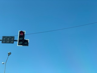 Obraz premium red traffic light in the sky