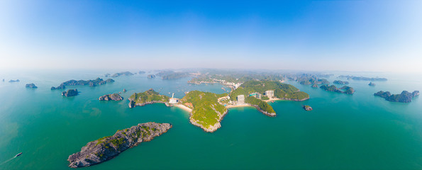 Aerial view: clear blue sky at Cat Ba island and beach, the biggest island in Ha Long Bay, unique...