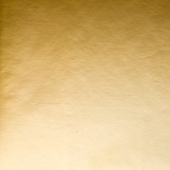 Fototapeta na wymiar Golden wrapping kraft paper backdrop