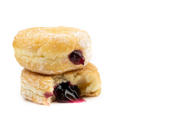Traditional Polish donuts isolated on white background.doughnuts with jam Blueberry shell