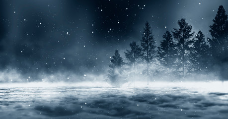 Dark winter forest background at night. Snow, fog, moonlight. Dark neon night background in the forest with moonlight. Neon figure in the center. Night view, magic.