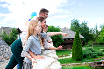 Naklejka premium Happy faces looking from the side of the bridge